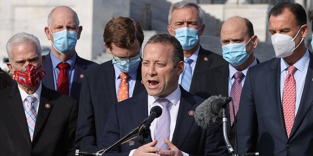 Rep. Josh Gottheimer, D-N.J., holds a news conference with fellow members of Congress to highlight the need for bipartisan, bicameral COVID-19 relief legislation outside the U.S. Capitol on Dec. 3, 2020, in Washington, D.C. Gottheimer is the leader of a group of nine moderate Democrats who say they'll vote against Democrats' budget resolution until the House passes the bipartisan infrastructure bill. (Photo by Chip Somodevilla/Getty Images)