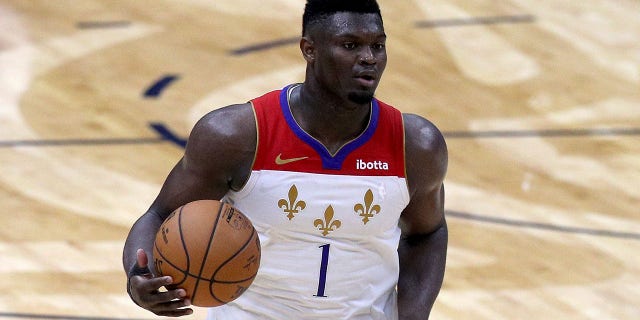 Zion Williamson #1 of the New Orleans Pelicans dribbles the ball downn court during the fourth quarter of an NBA game against the Golden State Warriors at Smoothie King Center on May 04, 2021 in New Orleans, Louisiana.