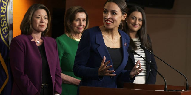 WASHINGTON, DC - JUNE 16: U.S. Rep. Alexandria Ocasio-Cortez (D-NY) (3rd L) speaks as (L-R) Rep. Angie Craig (D-MN), Speaker of the House Rep. Nancy Pelosi (D-CA) and Rep. Sara Jacobs (D-CA) listen during a news conference at the U.S. Capitol June 16, 2021 in Washington, DC. Speaker Pelosi held a news conference to announce members of the newly established Select Committee on Economic Disparity and Fairness in Growth. (Photo by Alex Wong/Getty Images)