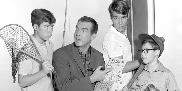 From left: Stanley Livingston as Chip Douglas, Fred MacMurray as Steve Douglas, Don Grady as Robbie Douglas and Barry Livingston as Ernie Thompson Douglas. 