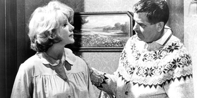 Actress Rita Hayworth and actor Glenn Ford on the set of the MGM movie ‘The Money Trap’ in 1965.
