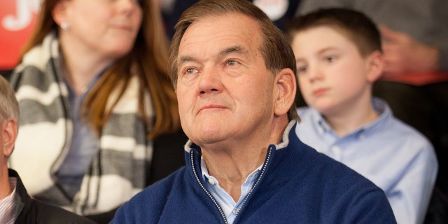 Former Homeland Security secretary Tom Ridge listen as Republican presidential candidate Jeb Bush speaks at a town hall-style meeting on February 6, 2016 at the McKelvie Intermediate School in Bedford, New Hampshire.
