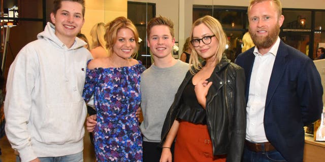 From left to right: Lev Bure, Candace Cameron Bure, Maksim Bure, Natasha Bure and Valeri Bure.  (Photo by Araya Diaz/Getty Images for Zondervan)