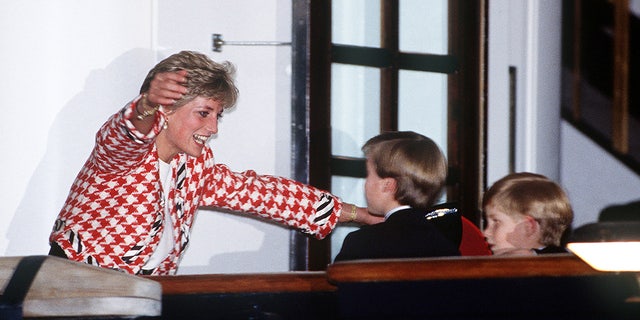 The Princess of Wales greets her sons Prince William and Prince Harry on the deck of the yacht Britannia in Toronto, when they joined their parents on an official visit to Canada, 23rd October 1991.