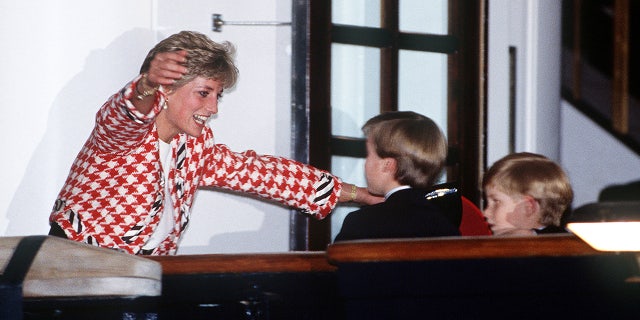 The Princess of Wales greets her sons Prince William and Prince Harry on the deck of the yacht Britannia in Toronto, when they joined their parents on an official visit to Canada, 23rd October 1991.