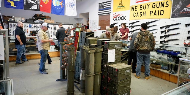 Customers wait at a store in Orem, Utah, on Thursday, March 25, 2021. Photographer: George Frey/Bloomberg via Getty Images