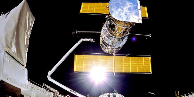 The Hubble Space Telescope is deployed on April 25, 1990, from the space shuttle Discovery.
