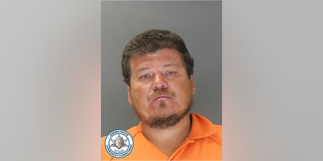 Hector Garcia, 32, is charged in connection with hitting and dragging a Colorado boy on a bicycle.
