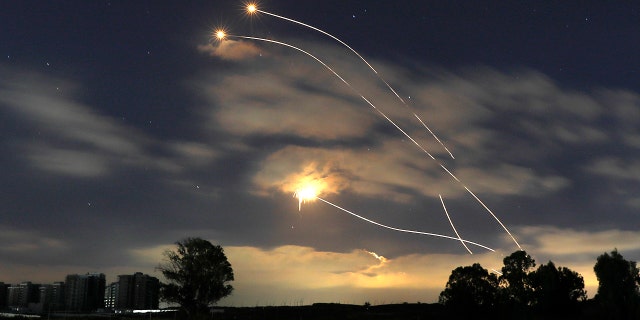 Israeli Iron Dome air defense system launches to intercept rockets fired from Gaza Strip, near Sderot, Israel, Thursday, May 13, 2021. (AP Photo/Ariel Schalit)