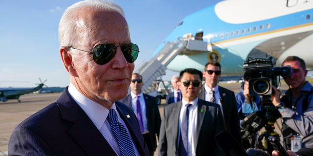 President Joe Biden speaks with reporters before boarding Air Force One at Heathrow Airport in London, Sunday, June 13, 2021. Biden is en route to Brussels to attend the NATO summit.