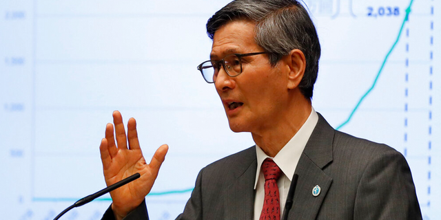 President of the Japan Community Health Care Organization Shigeru Omi attends a joint news conference with Japan's Prime Minister Yoshihide Suga (not in picture) on Japan's response to the coronavirus outbreak at Suga's official residence in Tokyo, Thursday, June 17, 2021.