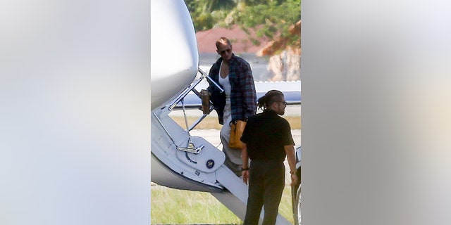 Jennifer Lopez wore the shirt while boarding a plane.