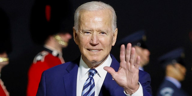 President Joe Biden waves on his arrival on Air Force One at Cornwall Airport Newquay, in Newquay, England,  ahead of the G-7 summit, Wednesday, June 9, 2021. (Phil Noble/Pool Photo via AP)