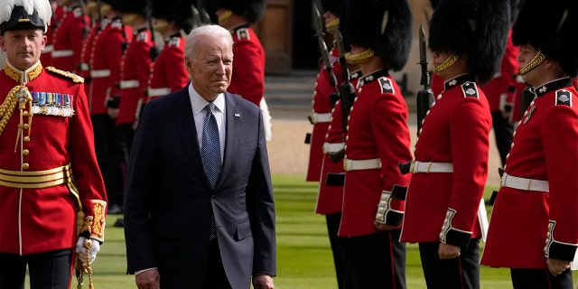 President Joe Biden inspects a Guard of Honour after arriving to meet Britain's Queen Elizabeth II at Windsor Castle near London, Sunday, June 13, 2021. (AP Photo/Matt Dunham, Pool)