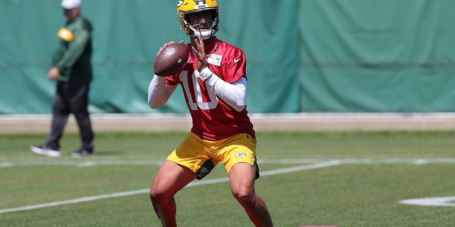 Jordan Love, No. 10 of the Green Bay Packers, works out during training camp at Ray Nitschke Field on June 8, 2021 in Ashwaubenon, Wisconsin.