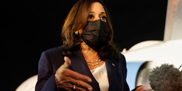June 7, 2021: Vice President Kamala Harris talks to the press gathered under the wing of Air Force Two as she prepares to depart for Mexico, from Guatemala's Air Force Central Command. (AP Photo/Jacquelyn Martin)