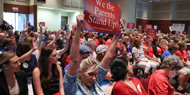 Parents protest critical race theory at a recent school board meeting in Loudoun County, Virginia.