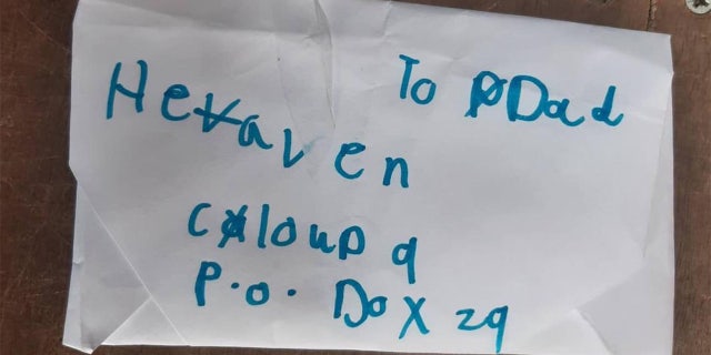 A mailman returned a letter to a young girl that was addressed to her "dad in heaven."