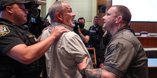 Parents like Jon Tigges, who was detained by cops at a Loudoun County School Board meeting discussing Critical Race Theory, in Ashburn, Virginia on June 22, 2021, have spoken against what is being taught to their students.