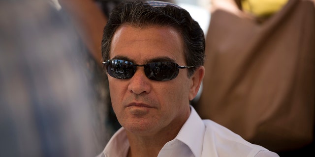 In this July 3, 2016, file photo, Yossi Cohen, then the director of Israel's Mossad intelligence agency, attends the funeral in Jerusalem of a rabbi killed by Palestinian gunmen. Cohen, the outgoing chief of Israel's Mossad intelligence service, offered the closest acknowledgment yet his country was behind a series of recent attacks targeting Iran's nuclear program and a military scientist in a television interview aired Thursday, June 10, 2021. (AP Photo/Oded Balilty, File)