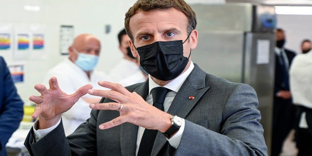 French President Emmanuel Macron talks to journalists Tuesday at the Hospitality school in Tain-l'Hermitage, southeastern France. (AP)