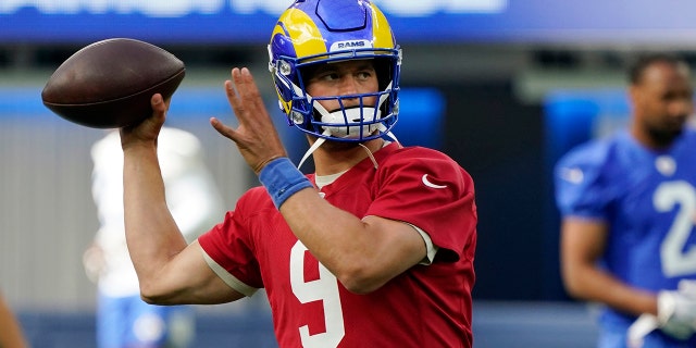 Los Angeles Rams quarterback Matthew Stafford throws during NFL football camp Thursday, June 10, 2021, in Inglewood, Calif. (AP Photo/Marcio Jose Sanchez)