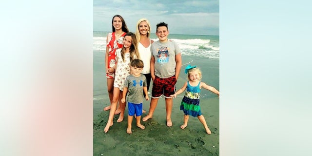 Melissa Henderson is pictured here with her five children.