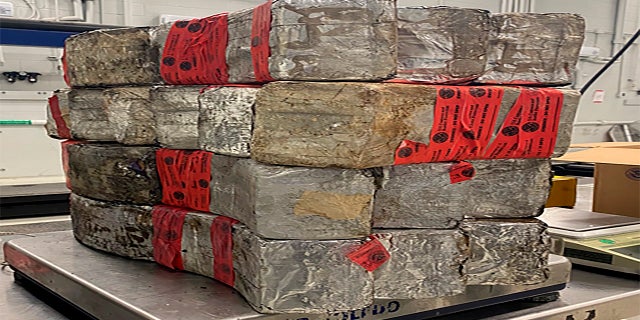 This undated photo provided by the U.S. Customs and Border Protection shows seized drug bundles containing 132 pounds of methamphetamine on display from Feb. 25, 2021, at the Laredo port of entry. The drugs were concealed in a vehicle driven by 23-year-old U.S. citizen traveling from Mexico. (AP/U.S. Customs and Border Protection)
