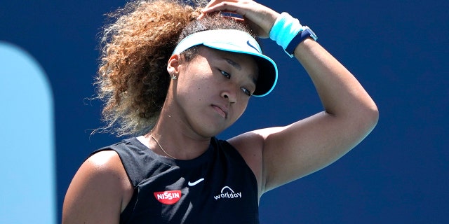 Naomi Osaka, of Japan, reacts during her match against Maria Sakkari, of Greece, in the quarterfinals of the Miami Open tennis tournament in Miami Gardens, Fla., in this Wednesday, March 31, 2021, file photo.