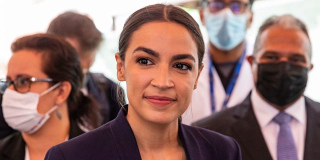 Representative Alexandria Ocasio-Cortez and other elected officials meet with employees at Elmhurst hospital in New York on June 4, 2021. (Photo by Lev Radin/Sipa USA)No Use Germany.