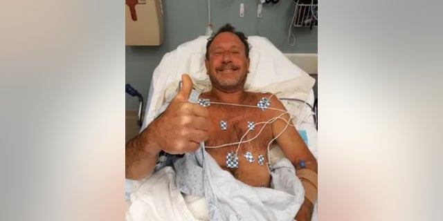Michael Packard, 56, recovers in a Cape Cod hospital after being swallowed by a humpback whale Friday off the coast of Massachusetts.
