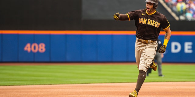 Tommy Pham of the San Diego Padres jogs around the bases after hitting a home run in the first inning against the New York Mets at Citi Field on June 13, 2021, in the Queens borough of New York City. (Matt Thomas/San Diego Padres/Getty Images)