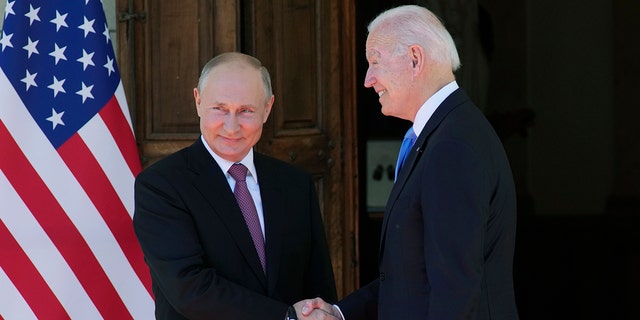 Russian President Vladimir Putin, left, and U.S President Joe Biden shake hands during their meeting at the 'Villa la Grange' in Geneva, Switzerland in Geneva, Switzerland, Wednesday, June 16, 2021. 