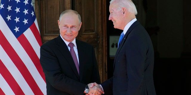 Russian President Vladimir Putin, left, and U.S President Joe Biden shake hands during their meeting at the 'Villa la Grange' in Geneva, Switzerland in Geneva, Switzerland, Wednesday, June 16, 2021.