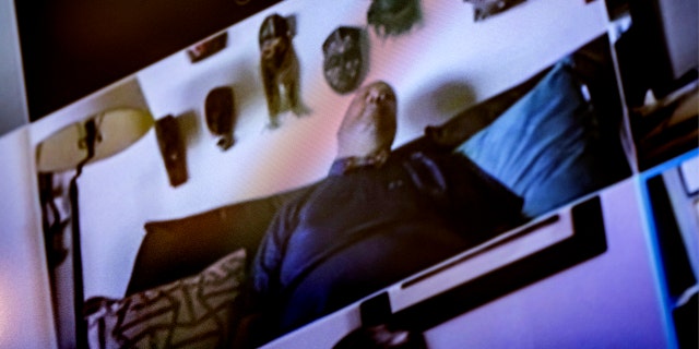 WASHINGTON, DC - MARCH 02: Rep. Donald Payne Jr. (D-NJ) falls asleep while remotely participating in a hearing by the Aviation Subcommittee of the House Committee on Transportation & Infrastructure on Capitol Hill on March 2, 2021 in Washington, DC. The U.S. airline industry has been heavily impacted by the coronavirus pandemic, with passenger traffic falling by 60 percent in 2020. (Photo by Samuel Corum/Getty Images)