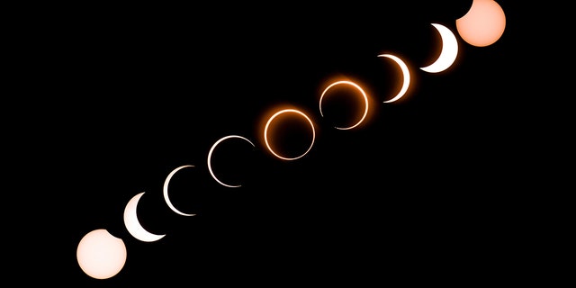TOPSHOT - This composite image shows the moon as it moves in front of the sun in a rare "ring of fire" solar eclipse as seen from Tanjung Piai in Malaysia on December 26, 2019. (Photo by Sadiq ASYRAF / AFP) (Photo by SADIQ ASYRAF/AFP via Getty Images)