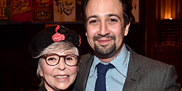 Lin-Manuel Miranda posing with EGOT winner Rita Moreno. 