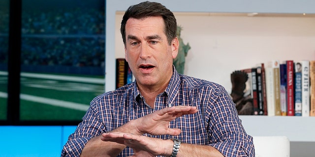 Rob Riggle believes his estranged wife spied on him with a hidden camera.