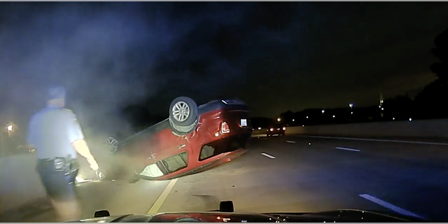 After the PIT maneuver, Harper's car came to a stop upside down in the middle of the highway.