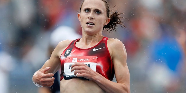 Houlihan, the American record holder in the 1,500 and 5,000 meters, posted on social media that she’s been banned for four years following a positive test for what she concluded was a tainted pork burrito. Houlihan said she received an email from the Athletics Integrity Unit (AIU) on Jan. 14, 2021, notifying her that a drug testing sample returned a finding for the anabolic steroid nandrolone. (AP Photo/Charlie Neibergall, File)