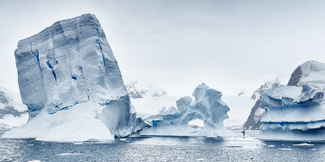 ANTARCTICA, FEBRUARY 2016: Stunning icebergs the size of small countries threaten to collapse, taken in February 2016, Antarctica. (Credit: Freedive Antarctica / Barcroft M / Barcroft Media via Getty Images)
