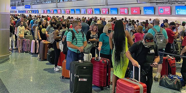 Long lines at McCarran International Airport in Nevada after Southwest Airlines grounded its fleet of planes.