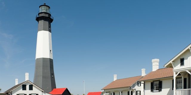 "A sunny view of the historic Tybee Island Lighthouse in Georgia, one of the famous lighthouses on the Eastern seaboard of America"