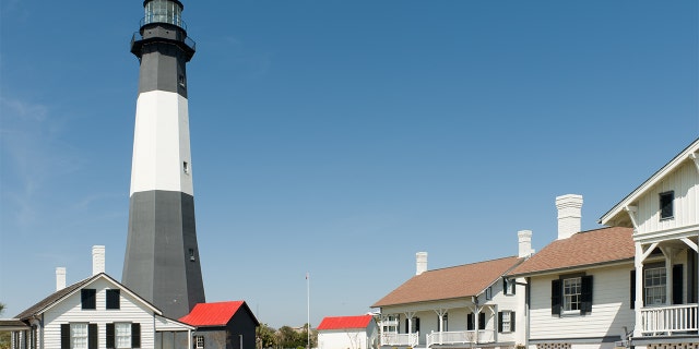 "A sunny view of the historic Tybee Island Lighthouse in Georgia, one of the famous lighthouses on the Eastern seaboard of America"