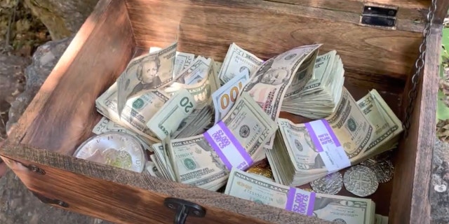 David Cline and John Maxim hid $10,000 in cash in a treasure chest buried in Utah for their second annual treasure hunt.