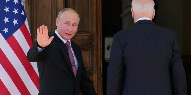 Russian President Vladimir Putin, left, and U.S President Joe Biden enter the 'Villa la Grange' in Geneva, Switzerland in Geneva, Switzerland, Wednesday, June 16, 2021. (AP Photo/Alexander Zemlianichenko, Pool)