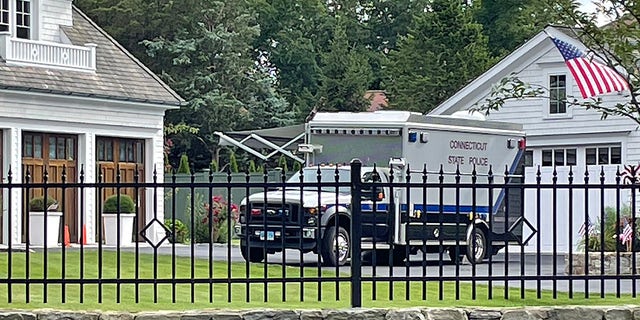 A Connecticut State Police truck is seen outside a Westport home where the bodies of a mother and daughter were found Thursday. (Connor Ryan/Fox News)