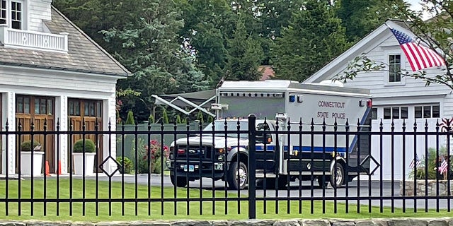 A Connecticut State Police truck is seen outside a Westport home where the bodies of a mother and daughter were found Thursday. (Connor Ryan/Fox News)