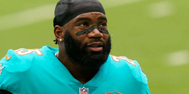 FILE - Miami Dolphins cornerback Xavien Howard (25) warms up before an NFL football game against the Cincinnati Bengals in Miami Gardens, Fla., In this Sunday, Dec. 6, 2020, file photo.