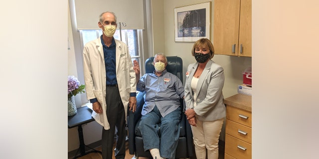 Dr. Stephen Salloway, director of the memory and aging program at Butler Hospital, patient Marc Archambault, and friend Karen Poole. (Photo courtesy of Care New England Health System and Butler Hospital)